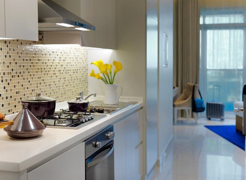 Damac Maison The Vogue Dubái Exterior foto A typical kitchen
