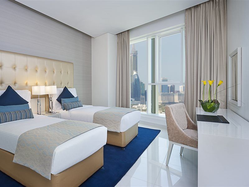 Damac Maison The Vogue Dubái Exterior foto A guest room at the Address Downtown Hotel